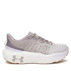 Buty do biegania Under Armour. Szare obuwie sportowe damskie Under Armour, bez wzorów, bez zapięcia, do biegania. Za 439.99 zł.