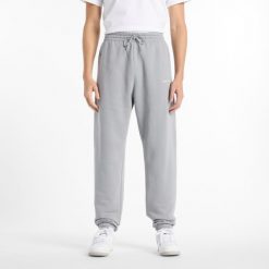 Spodnie męskie New Balance MP51505YST – szare. Szare spodnie sportowe męskie New Balance, m, bez wzorów, z bawełny. Za 169.99 zł.