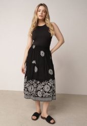 Czarna Rozkloszowana Spódnica z Wiskozy w Kwiatowy Wzór Masterore. Czarne spódnice damskie Born2be, do pracy, uniwersalny, bez wzorów, z jeansu, biznesowe, midi, dopasowane. Za 59.99 zł.