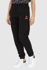 KENZO Czarne spodnie dresowe damskie z kwiatkiem, Rozmiar L. Czarne spodnie dresowe damskie Kenzo, bez wzorów, z dresówki. W wyprzedaży za 699.99 zł.