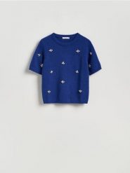 Sweter z błyszczącą aplikacją - niebieski. Niebieskie swetry nierozpinane damskie Reserved, l, z aplikacjami, z dzianiny, bez kołnierzyka, bez ramiączek. Za 139.99 zł.