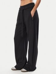 Adidas Spodnie dresowe Premium Essentials Firebird KR4518 Czarny Relaxed Fit. Czarne spodnie dresowe damskie Adidas, bez wzorów, z bawełny. Za 439.99 zł.