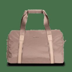 WINGS Torba sportowo - podróżna SKYLARK beige. Brązowe torby podróżne damskie Wings, w ażurowe wzory, z materiału, duże. Za 129.90 zł.