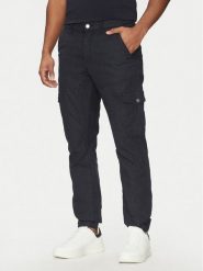 Guess Spodnie materiałowe M5RB54 WGXY1 Granatowy Slim Fit. Niebieskie spodnie materiałowe męskie Guess, z aplikacjami, z bawełny. Za 319.99 zł.