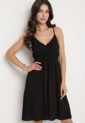Czarna Wiskozowa Sukienka z Kopertowym Dekoltem Arileme. Czarne sukienki damskie Born2be, l, bez wzorów, z wiskozy, eleganckie, bez kołnierzyka, bez ramiączek, mini, kopertowe. Za 79.99 zł.