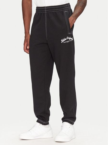 Adidas Spodnie dresowe JP4487 Czarny Regular Fit. Czarne spodnie sportowe męskie Adidas, m, bez wzorów, z bawełny. Za 219.99 zł.