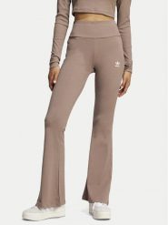 Adidas Legginsy Essentials JC9023 Beżowy Flare Fit. Brązowe legginsy damskie Adidas, bez wzorów, z bawełny. W wyprzedaży za 139.99 zł.