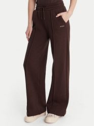 Guess Spodnie dresowe V6RB17 K9V31 Brązowy Regular Fit. Brązowe spodnie dresowe damskie Guess, z aplikacjami, z bawełny. Za 349.99 zł.