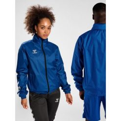 Kurtka ortalionowa piłkarska dla dorosłych Hummel Core XK Spray Jacket. Niebieskie kurtki męskie Hummel, m, bez wzorów, sportowe, bez kaptura. Za 212.50 zł.