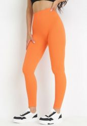 Pomarańczowe Prążkowane Legginsy Saleen. Brązowe legginsy damskie Born2be, bez wzorów, z jeansu. Za 34.99 zł.