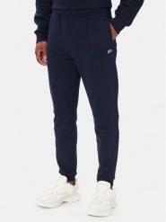 Lacoste Spodnie dresowe XH9833 Granatowy Regular Fit. Niebieskie spodnie sportowe męskie Lacoste, m, bez wzorów, z bawełny. Za 549.99 zł.