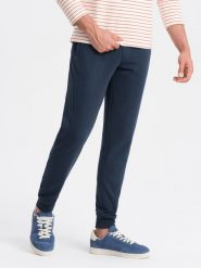 Bawełniane męskie spodnie dresowe joggery BASIC – granatowe V1 OM-PABS-0174 - XXL. Niebieskie spodnie sportowe męskie Ombre Clothing, l, bez wzorów, z bawełny. Za 119.99 zł.