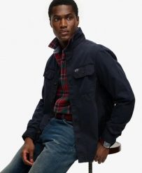 Superdry Two Pocket Overshirt – koszula‑kurtka 100% bawełna, relaxed fit. Niebieskie koszule damskie Superdry, xl, z aplikacjami, z bawełny, bez kołnierzyka, bez ramiączek. Za 352.05 zł.