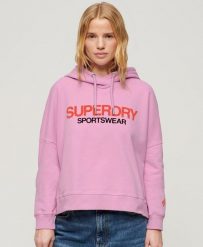 Luźna bluza z kapturem z logo odzieży sportowej. Niebieskia bluzy damskie Superdry, bez wzorów, z bawełny, eleganckie, bez ramiączek, z kapturem. Za 313.95 zł.