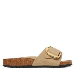 Klapki Birkenstock. Brązowe klapki damskie Birkenstock, bez wzorów, bez obcasa, bez zapięcia. Za 469.99 zł.