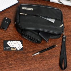 Saszetka męska skórzana do ręki czarna Beltimore R02. Czarne saszetki i nerki męskie bez wzorów. Za 99.90 zł.