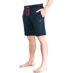 Emporio Armani Spodnie do spania Niebieski. Niebieskie piżamy męskie Emporio Armani, l, bez wzorów, z bawełny, bez kołnierzyka, bez ramiączek. Za 335.95 zł.