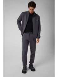 Guess Spodnie dresowe Z2YB09 KB3P2 Szary ciemny Regular Fit. Szare spodnie materiałowe męskie Guess, l, z aplikacjami, z bawełny. Za 434.99 zł.