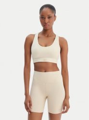Reebok Biustonosz sportowy Reebok x Ewa Chodakowska Ela RK25615CCW Beżowy. Brązowe koszulki sportowe damskie Reebok, xs, bez wzorów, z syntetyku, bez ramiączek, na fitness i siłownię. Za 179.99 zł.
