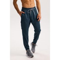 Męskie spodnie dresowe Rough Radical Dynamic Pro Joggers Men. Czarne spodnie sportowe męskie ROUGH RADICAL, m, bez wzorów, z dresówki, na fitness i siłownię. W wyprzedaży za 144.42 zł.