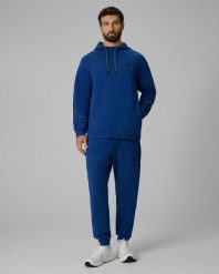4F Spodnie dresowe joggery męskie - granatowe S. Niebieskie spodnie materiałowe męskie 4F, bez wzorów, z dresówki. Za 159.99 zł.