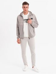 Męska lekka kurtka z łączonych materiałów z kapturem i ozdobnym pikowaniem – popielata V3 OM-JANP-0160 - XXL. Szare kurtki męskie Ombre Clothing, l, z aplikacjami, z gumy, z kapturem. W wyprzedaży za 139.99 zł.
