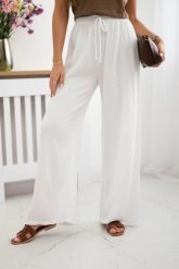 Spodnie muślinowe z szeroką nogawką białe. Białe spodnie materiałowe damskie KESI, na lato, bez wzorów, z bawełny, biznesowe, plus size. Za 150.52 zł.