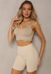 Beżowe Elastyczne Szorty Biker o Fasonie Bodycon Marelliam. Brązowe szorty damskie Renee, z aplikacjami, z materiału, sportowe. Za 29.99 zł.