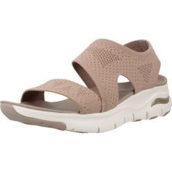 Sandały SKECHERS ARCH FIT Brązowy. Brązowe sandały damskie Skechers, bez wzorów, z materiału, bez obcasa, bez zapięcia. Za 490.00 zł.