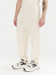EA7 Emporio Armani Spodnie dresowe 7M000154 AF10432 U1079 Écru Regular Fit. Spodnie sportowe męskie EA7 Emporio Armani, l, bez wzorów, z bawełny. Za 279.99 zł.