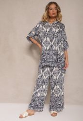 Granatowy Komplet z Wiskozą o Kroju Oversize Koszula i Spodnie Nilarithia. Niebieskie koszule damskie Renee, m, bez wzorów, z materiału, eleganckie, bez kołnierzyka, bez ramiączek. Za 89.99 zł.