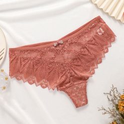 Figi koronkowe z ozdobnymi paseczkami na specjalne okazje Pansie. Żółte majtki damskie Intica, z koronki. Za 59.00 zł.