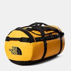 Plecak Sportowy The North Face Base Camp Duffel Czarny. Żółte plecaki męskie The North Face, bez wzorów, z poliesteru, biznesowe. Za 777.35 zł.