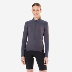 Bluza rowerowa damska Rockrider XC długi rękaw. Niebieskie bluzy damskie ROCKRIDER, m, bez wzorów, z elastanu, sportowe, bez ramiączek, bez kaptura. Za 179.99 zł.