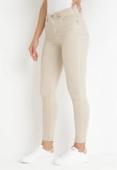 Beżowe Jeansy Skinny z Regularnym Stanem Ingas. Brązowe jeansy damskie Born2be, bez wzorów, z jeansu, krótkie. Za 74.99 zł.