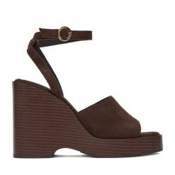 Sandały GINO ROSSI. Brązowe sandały damskie Gino Rossi, bez wzorów, bez obcasa, na koturnie, bez zapięcia. Za 249.99 zł.