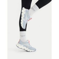 Buty do biegania Reebok. Niebieskie obuwie sportowe damskie Reebok, bez wzorów, bez zapięcia, do biegania. Za 489.99 zł.