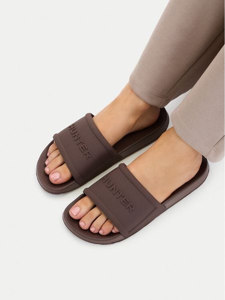 Hunter Klapki CEO-3C048 Brązowy. Brązowe klapki damskie Hunter, bez wzorów, z syntetyku, bez obcasa, bez zapięcia. Za 119.99 zł.