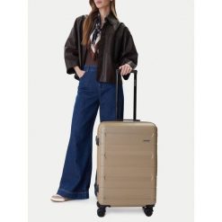 Walizka średnia GINO ROSSI. Brązowe walizki damskie Gino Rossi, bez wzorów, średnie. Za 299.99 zł.