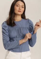 Niebieska Bluzka Daeicea. Niebieskie bluzki damskie Renee, bez wzorów, z bawełny, bez kołnierzyka, bez ramiączek. Za 59.99 zł.