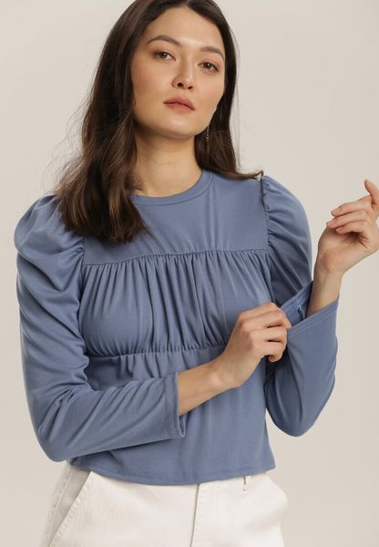 Niebieska Bluzka Daeicea. Niebieskie bluzki damskie Renee, bez wzorów, z bawełny, bez kołnierzyka, bez ramiączek. Za 54.99 zł.
