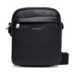 Saszetka Calvin Klein. Czarne saszetki i nerki męskie Calvin Klein, bez wzorów. Za 239.99 zł.