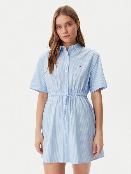 Tommy Jeans Sukienka koszulowa DW0DW20617 Błękitny Regular Fit. Niebieskie sukienki damskie Tommy Jeans, m, bez wzorów, z bawełny, bez kołnierzyka, bez ramiączek, koszulowe. Za 279.99 zł.