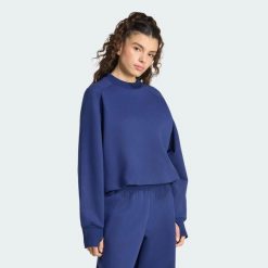 Bluza z dzianiny Soft Lux Winter. Niebieskie bluzy damskie Adidas, xs, bez wzorów, z bawełny, klasyczne, bez ramiączek, bez kaptura. Za 299.00 zł.