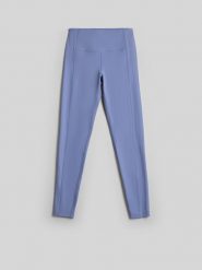 4F Legginsy do jogi szybkoschnące damskie - niebieskie XS. Niebieskie legginsy damskie 4F, bez wzorów, z materiału. Za 149.99 zł.
