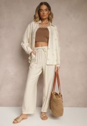 Beżowy Wiskozowy Komplet Oversize Zdobiony Haftem Koszula i Spodnie Sadrianae. Brązowe koszule damskie Renee, l, z aplikacjami, z materiału, eleganckie, bez kołnierzyka, bez ramiączek. Za 99.99 zł.