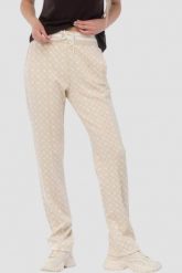 GUESS Beżowe damskie spodnie dresowe w monogram New Aggie, Rozmiar S. Brązowe spodnie dresowe damskie Guess, z aplikacjami, z dresówki. Za 489.99 zł.