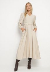 Beżowa Wiskozowa Sukienka o Rozkloszowanym Kroju z Paskiem z Klamerką Arilesse. Brązowe sukienki damskie Born2be, na co dzień, l, bez wzorów, z materiału, eleganckie, bez kołnierzyka, bez ramiączek, maxi, rozkloszowane. Za 159.99 zł.
