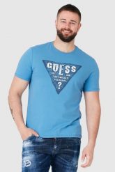 GUESS Niebieski t-shirt męski z dużym logo, Rozmiar S. Niebieskie t-shirty męskie Guess, m, z aplikacjami, bez kołnierzyka, bez ramiączek. W wyprzedaży za 109.99 zł.