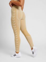 Legginsy damskie Hummel MT Lulu. Brązowe legginsy damskie Hummel, bez wzorów, z dzianiny. Za 177.05 zł.